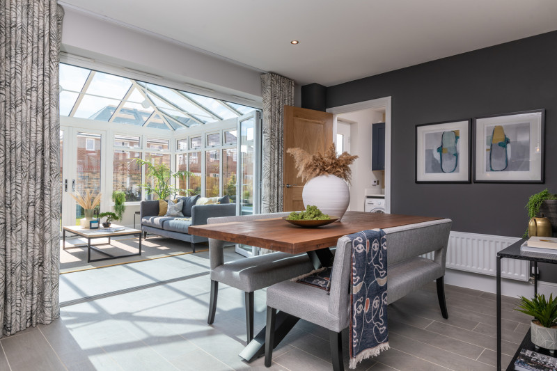 This open plan kitchen and conservatory creates a sense of flow between home and garden