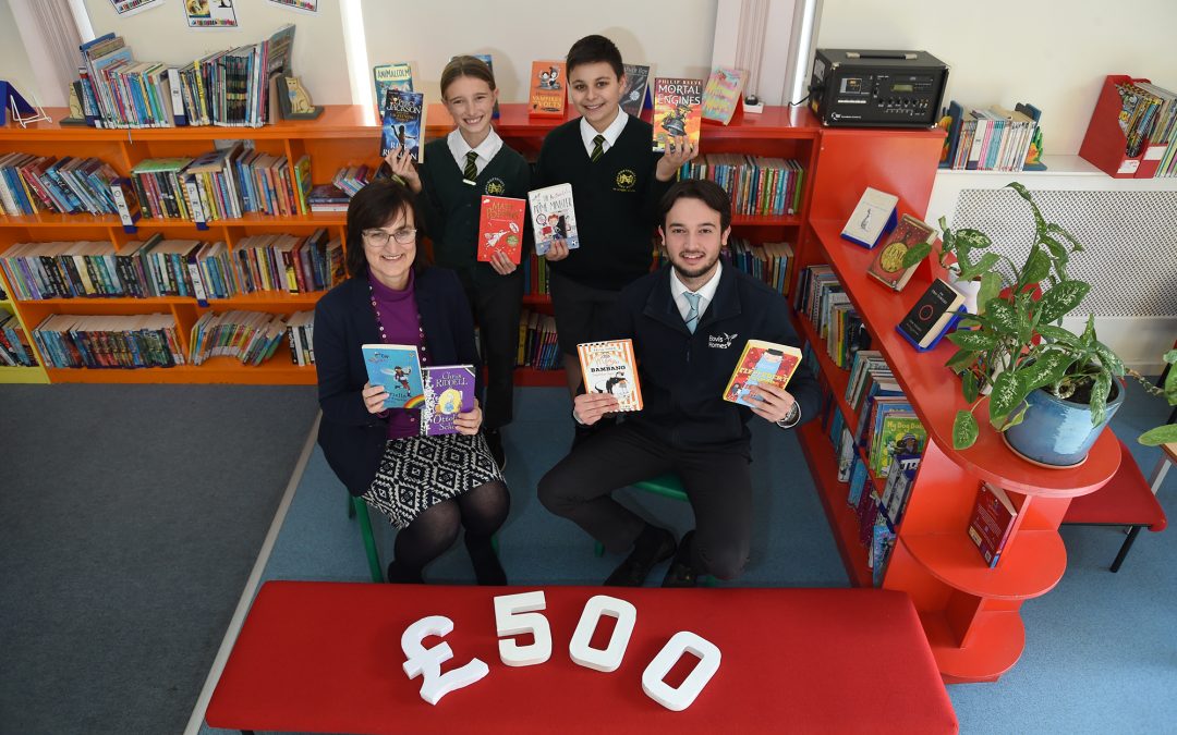 School stocks up library with housebuilder’s donation